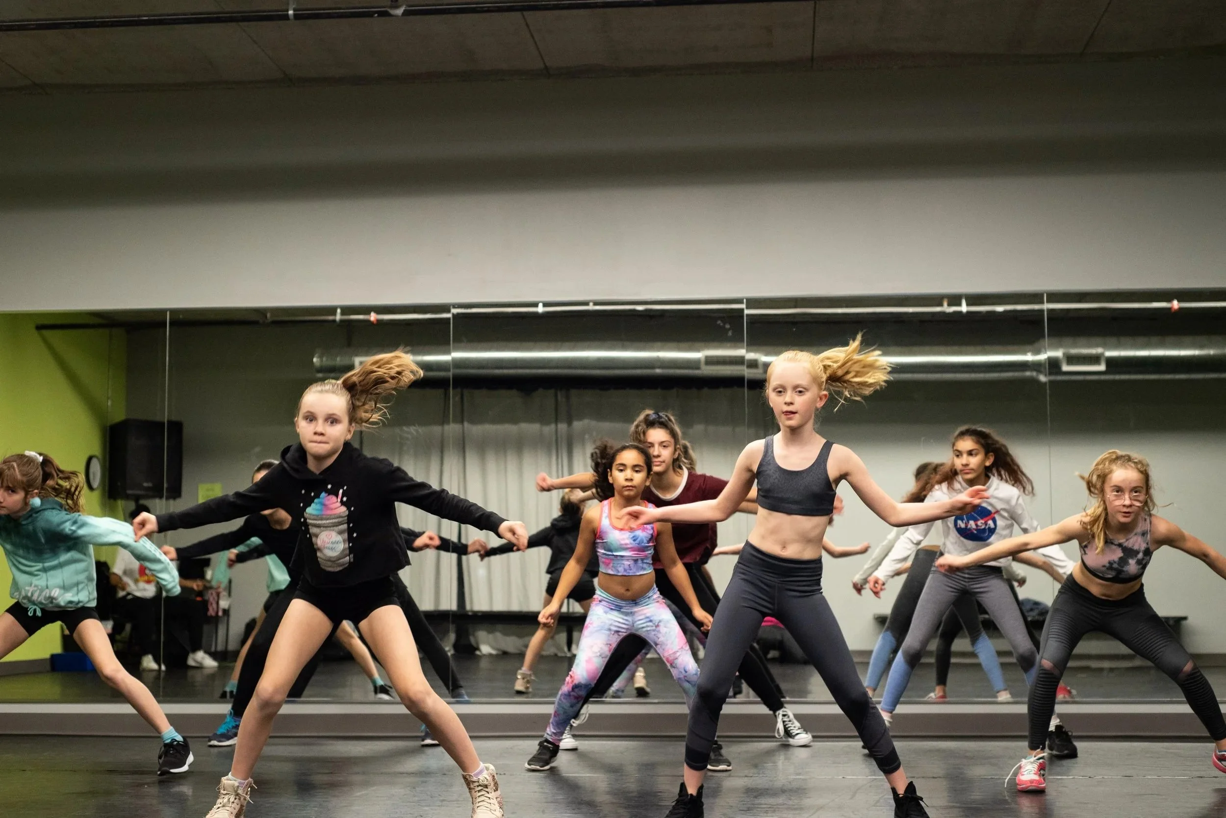 children having fun in a hip hop class at emotion dance company in Guelph, ON.