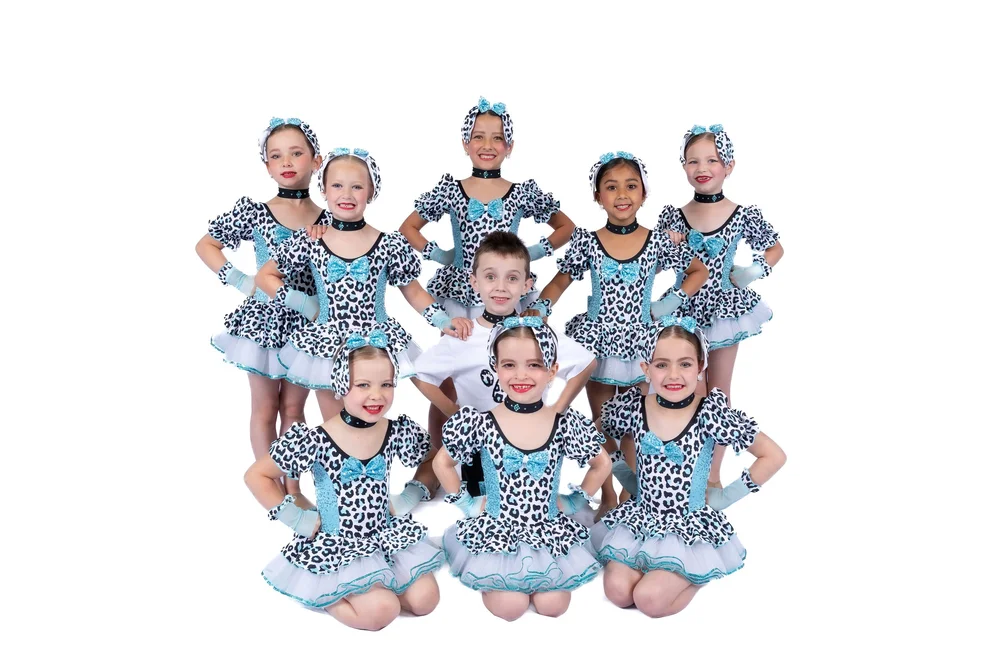 Micro Mini Company dancers in matching costumes