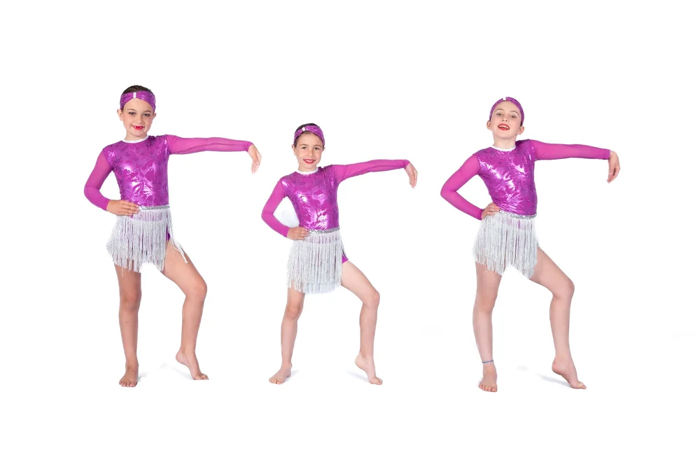 Youth acro dancers posing together