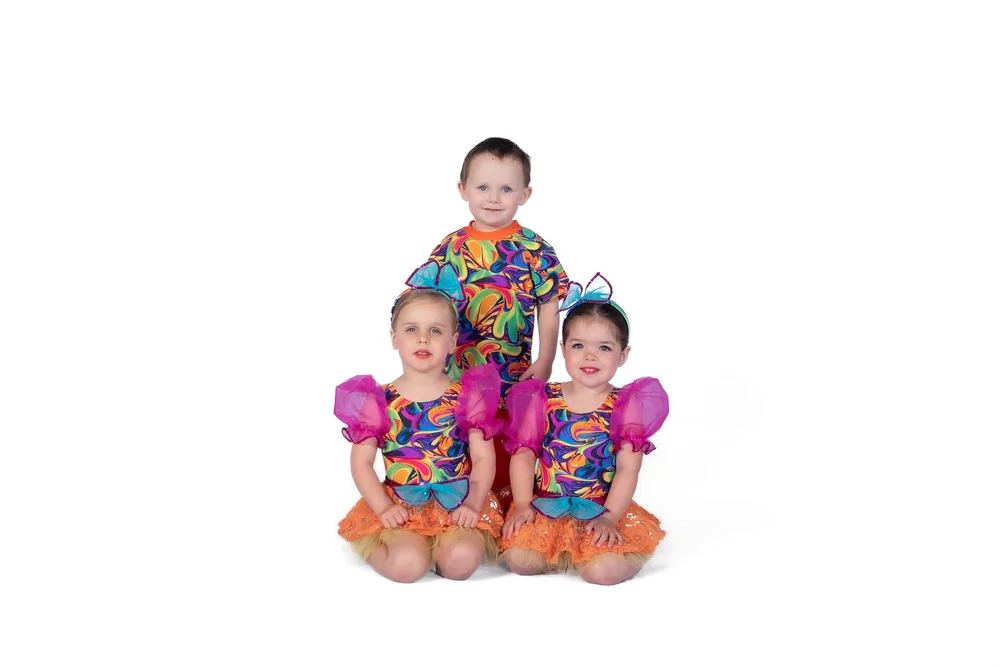 Young Shining Stars dancers in colourful jazz and tap costumes