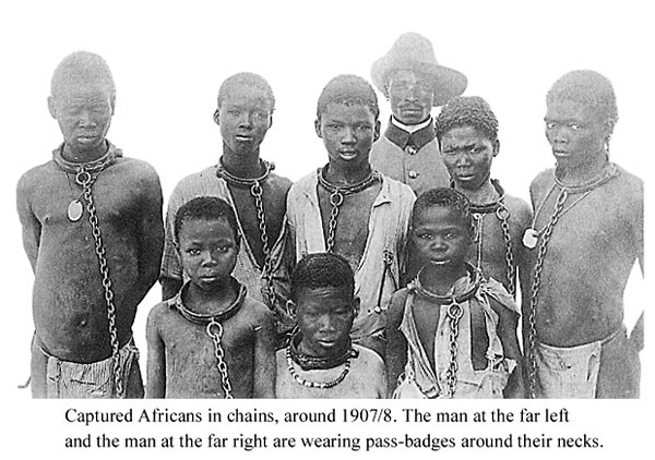 Chained African men during the war with Germany 1907