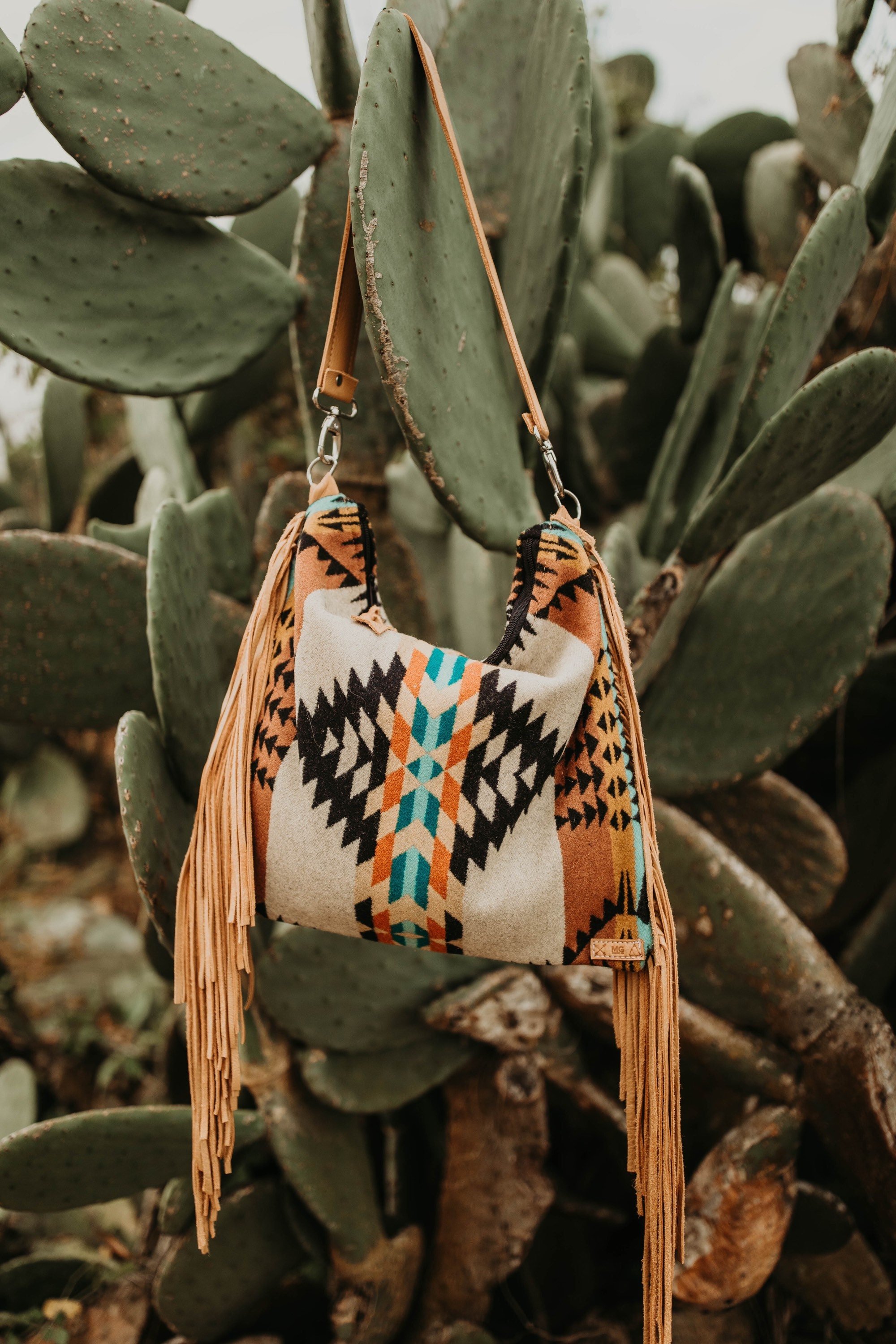 native purse hanging on a cactus