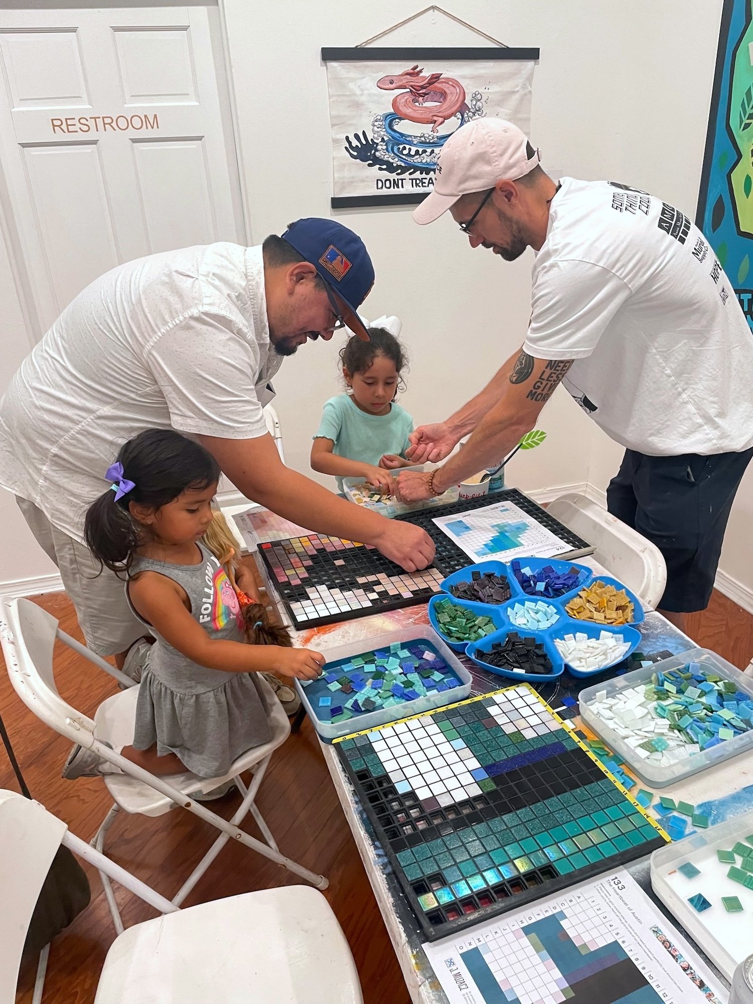 2c_Participants and children working on grids.jpg
