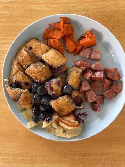 Blueberry pancakes with sweet potatoes, chicken apple sausage and fresh blueberries