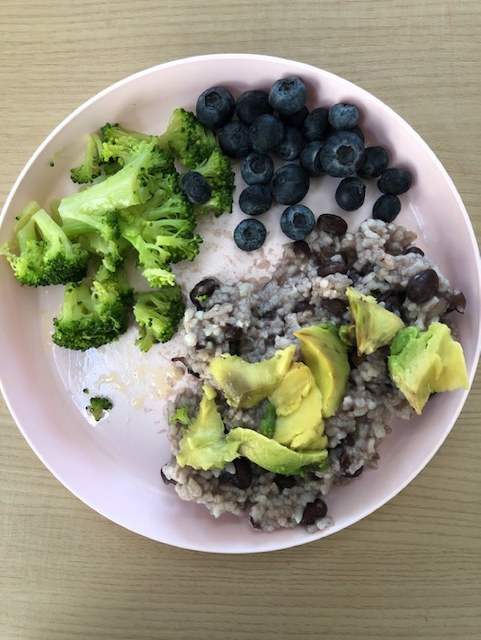 Beans and rice with avocado, broccoli, and blueberries