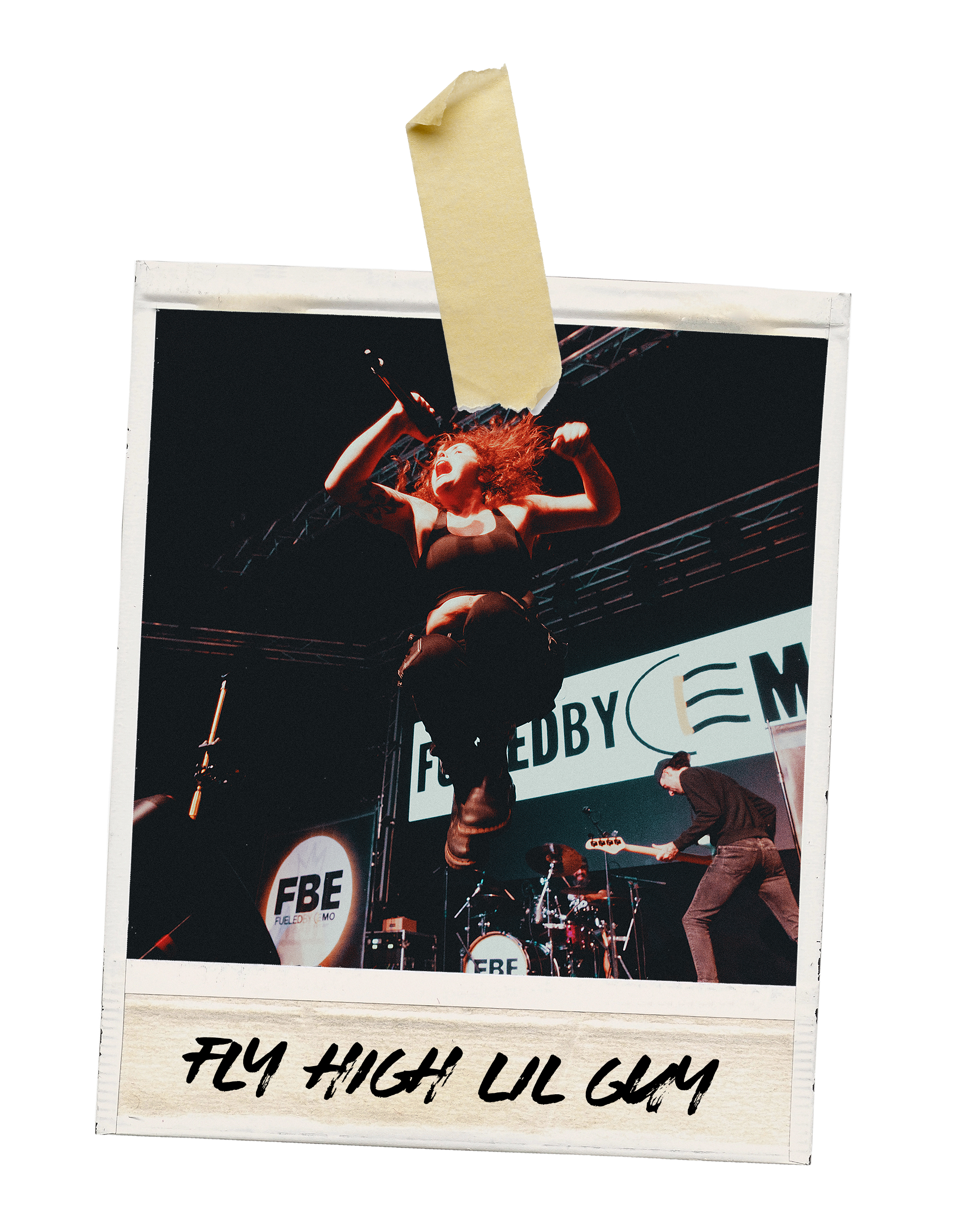 Photograph of a singer mid-air on stage, with band members playing instruments in the background, and a sign reading 'FUELED BY' on a screen behind them. The photo has a Polaroid style with handwritten text 'FLY HIGH ULL GUY' at the bottom.