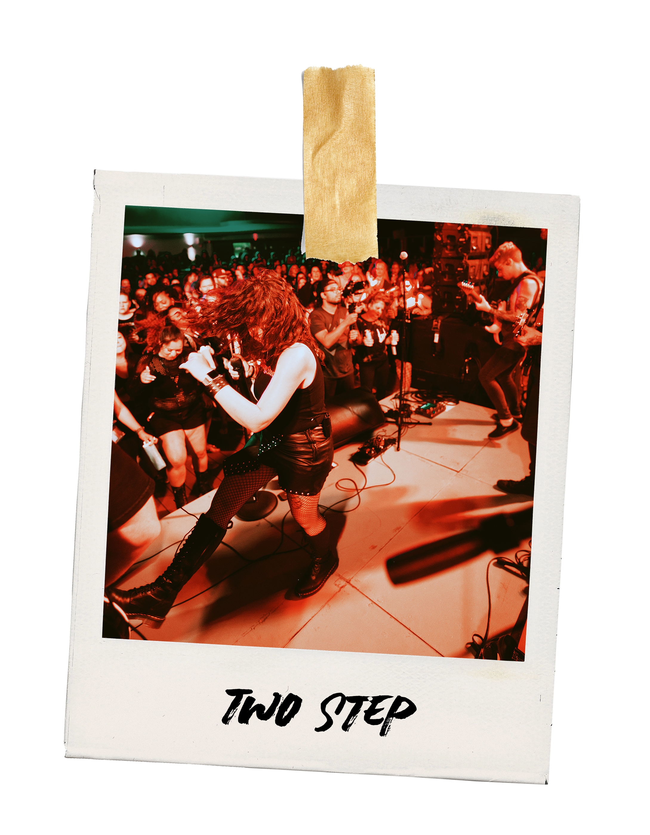 A taped up polaroid photo of a woman performing on stage at a concert, crowd dancing, with red lighting. The photo has "two step" written on it