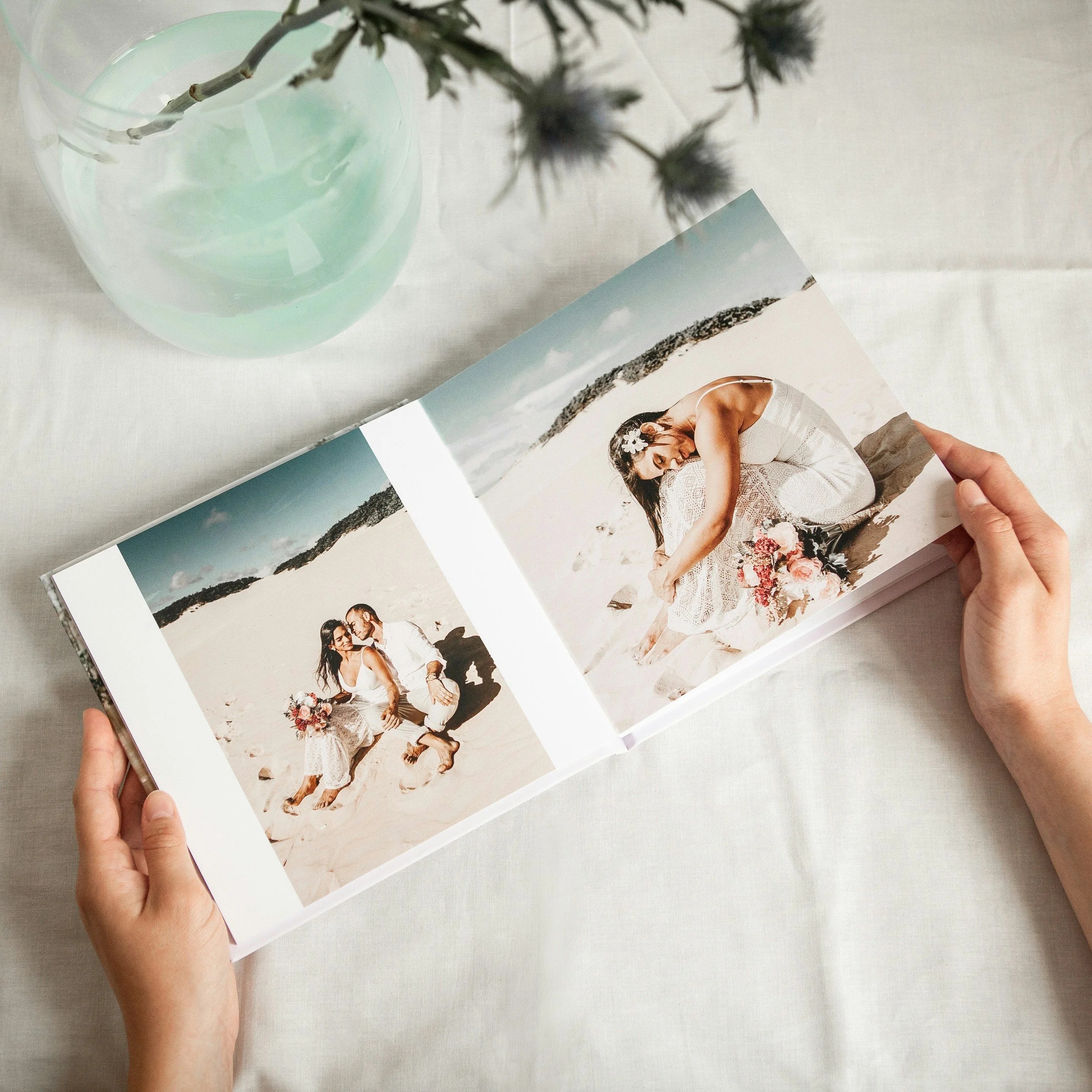 Group of unorganized printed photos waiting to be sorted by a professional organizer at Unburdened.