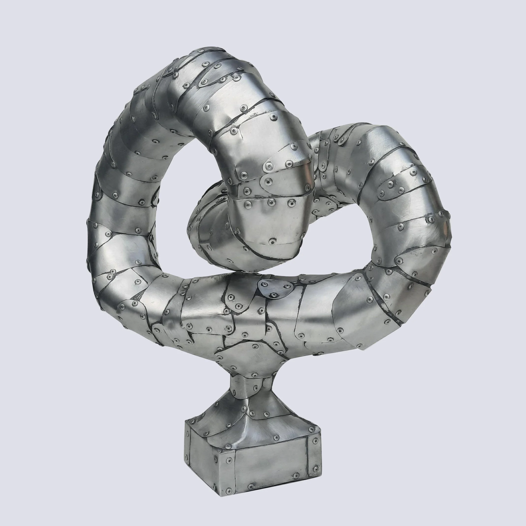 An aspect of a sculpture made of riveted aluminium by Stephen Bond entitled Resilience