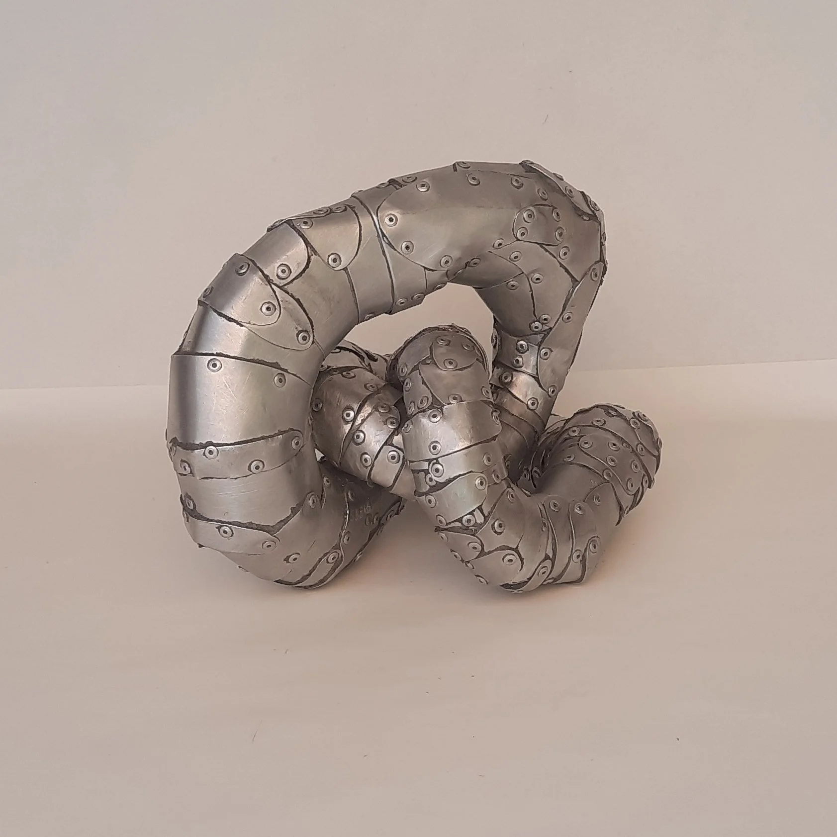 A front aspect of a sculpture by Stephen Bond entitled Small Loophole No 5