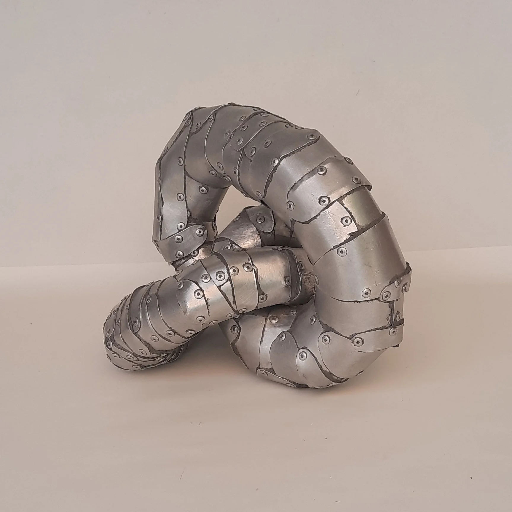 A front aspect of a sculpture by Stephen Bond entitled Small Loophole No 5