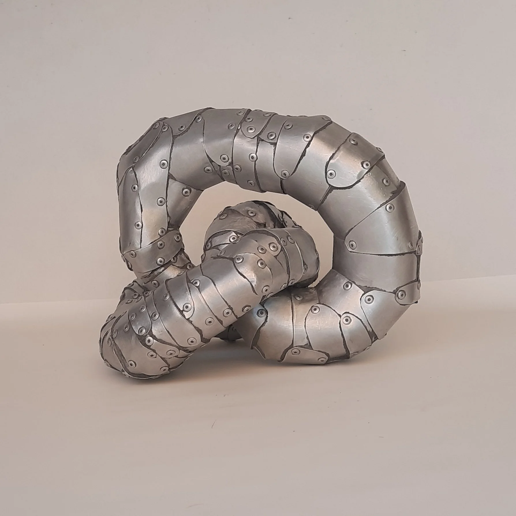 A front aspect of a sculpture by Stephen Bond entitled Small Loophole No 5