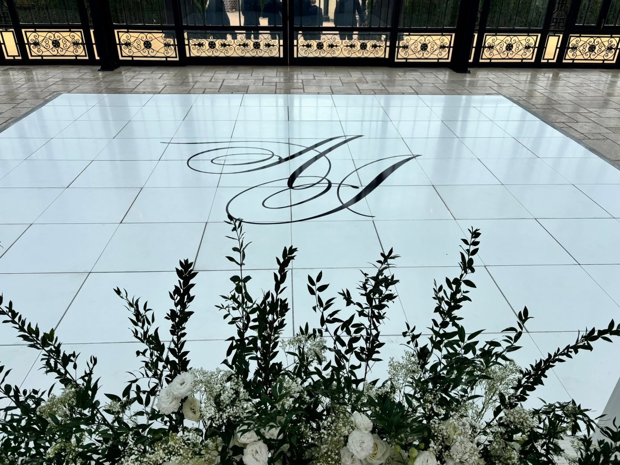 White Dance floor with custom Black Logo.JPG