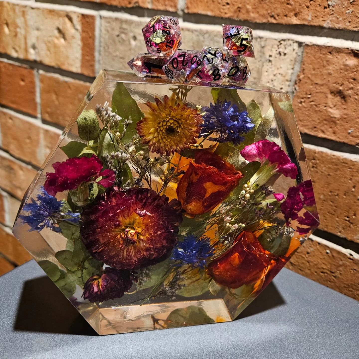 It's been so long since I have had the time to make something! (Grad school is all consuming). 
I was put in charge of perserving this wedding bouquet, and I think it turned out wonderfully. I have never cast something so large and was terrified, but