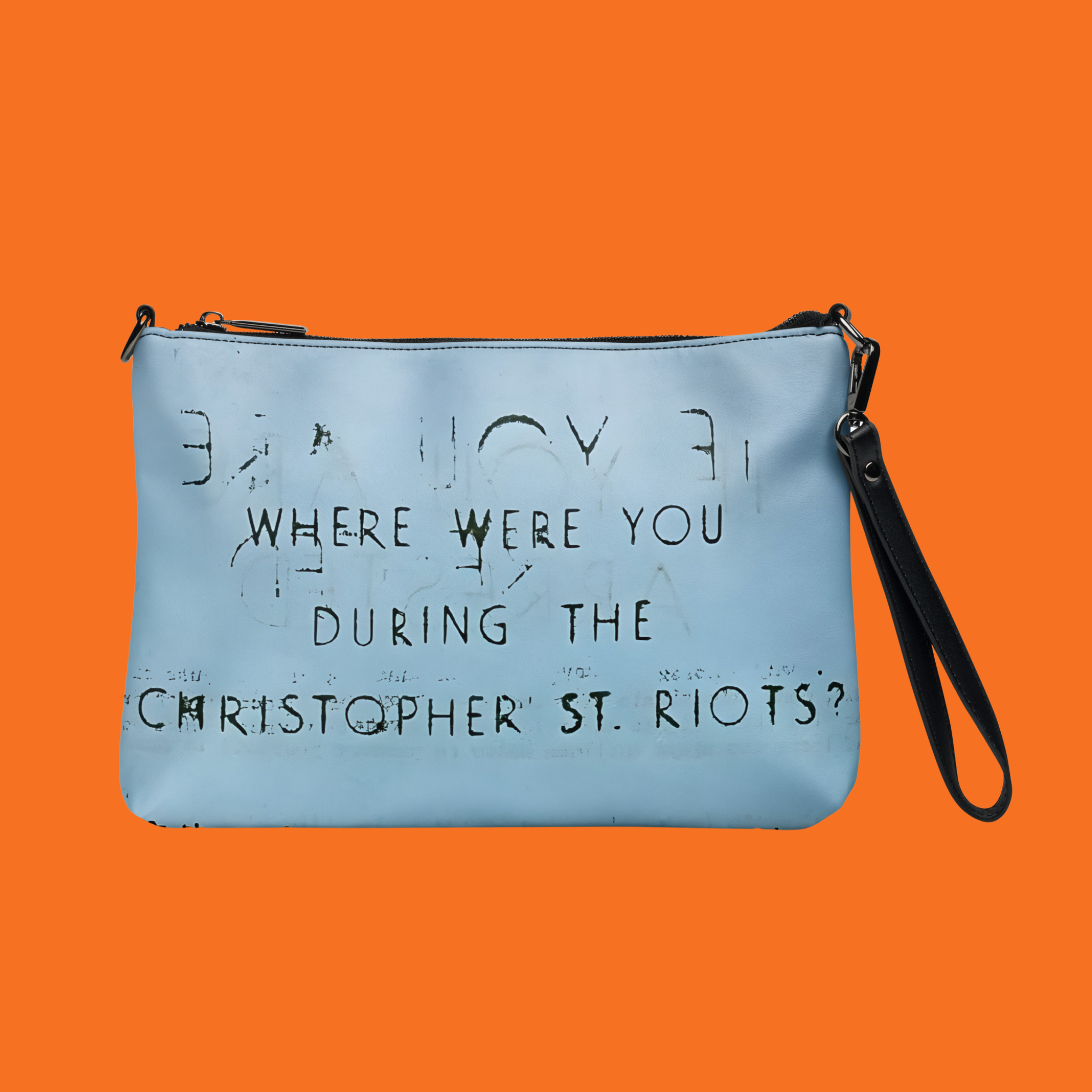 Purse with a flyer from the stonewall riots on it
