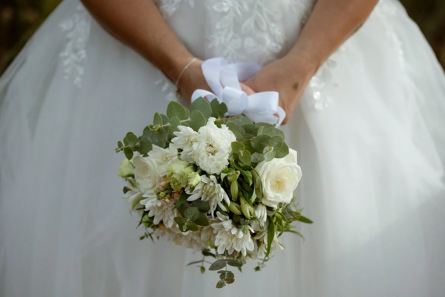 Bride holding flowers