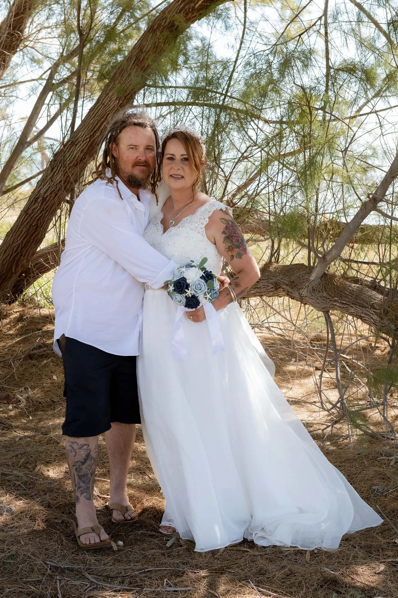 Bride and Groom embrace 