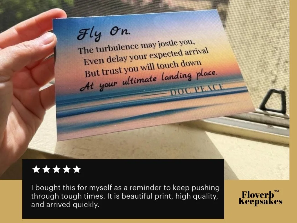 Card in hand reading “fly on” with positive customer review below