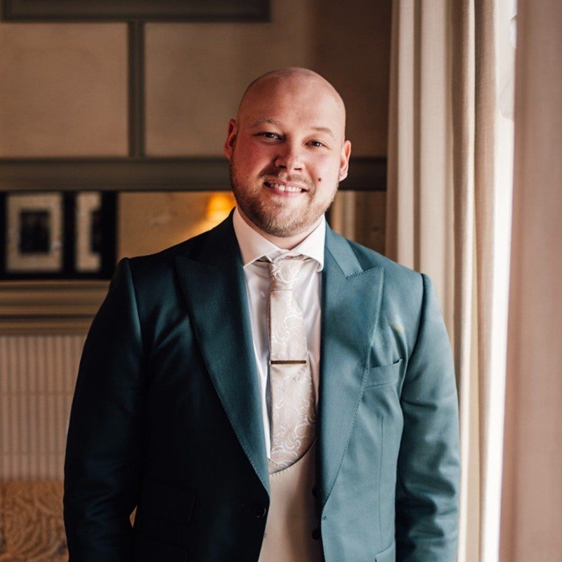 Photo of a man in a suit
