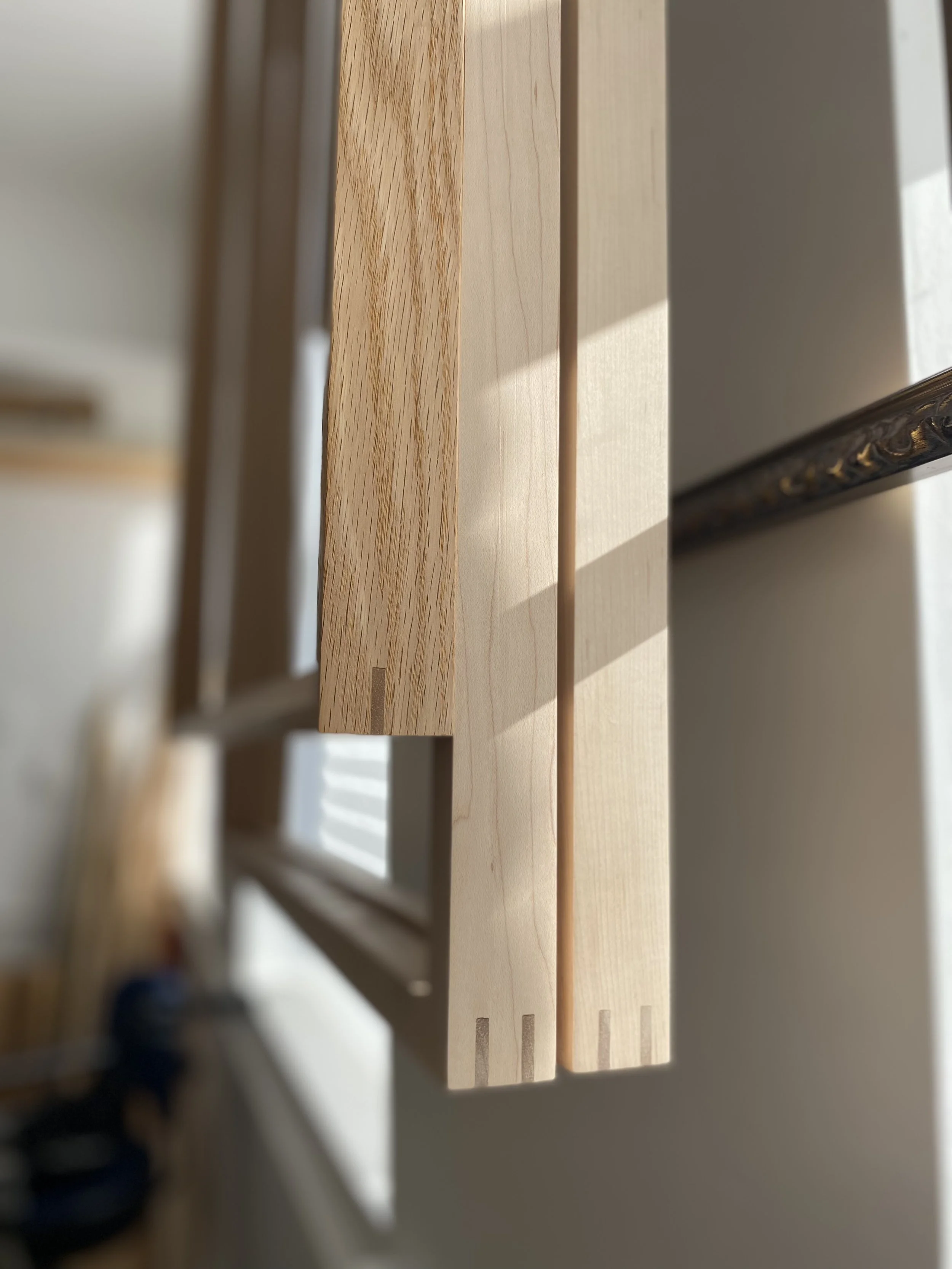 maple and oak frames with walnut splines