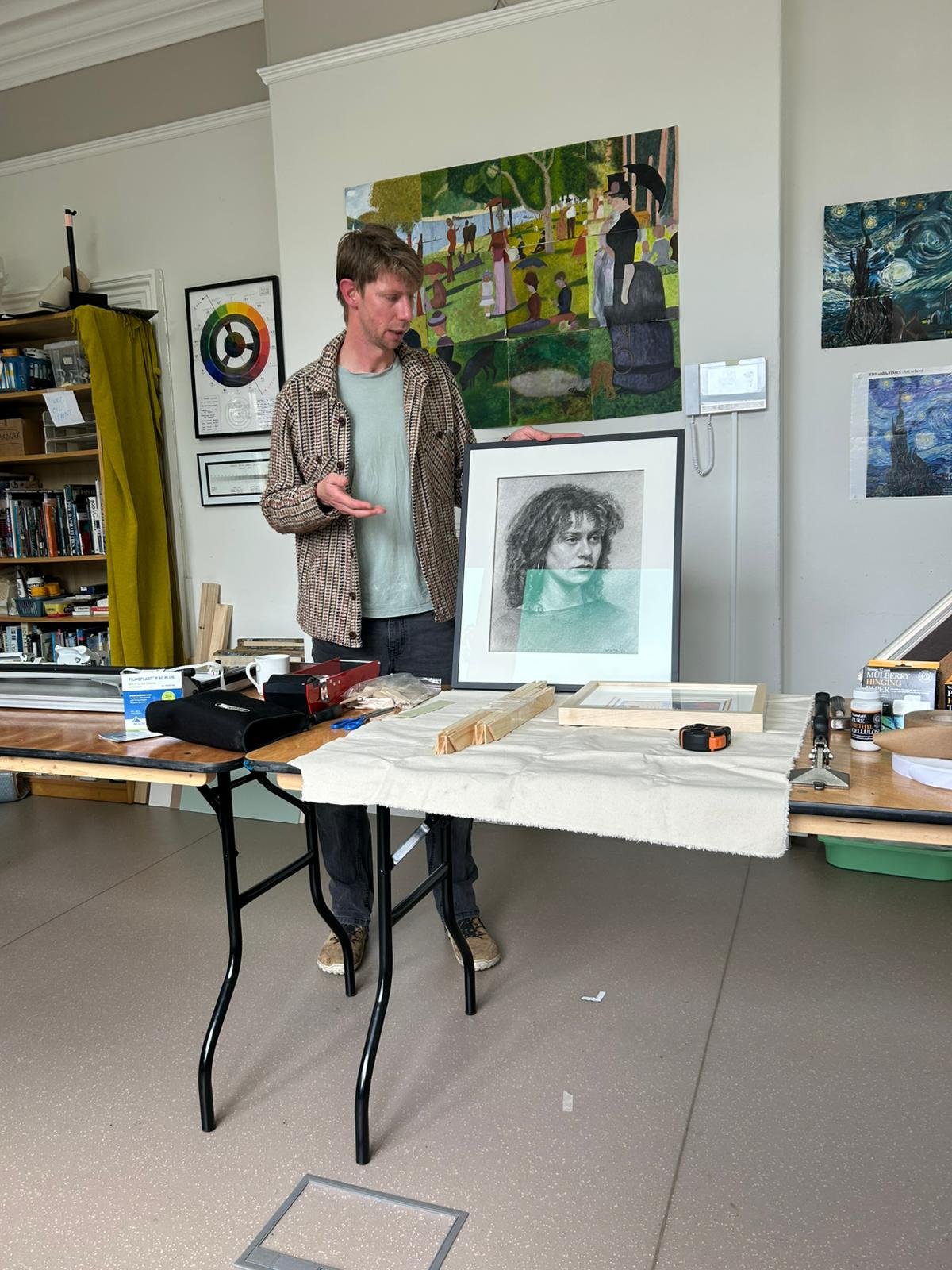 showing a framed charcoal drawing with a gutter mount