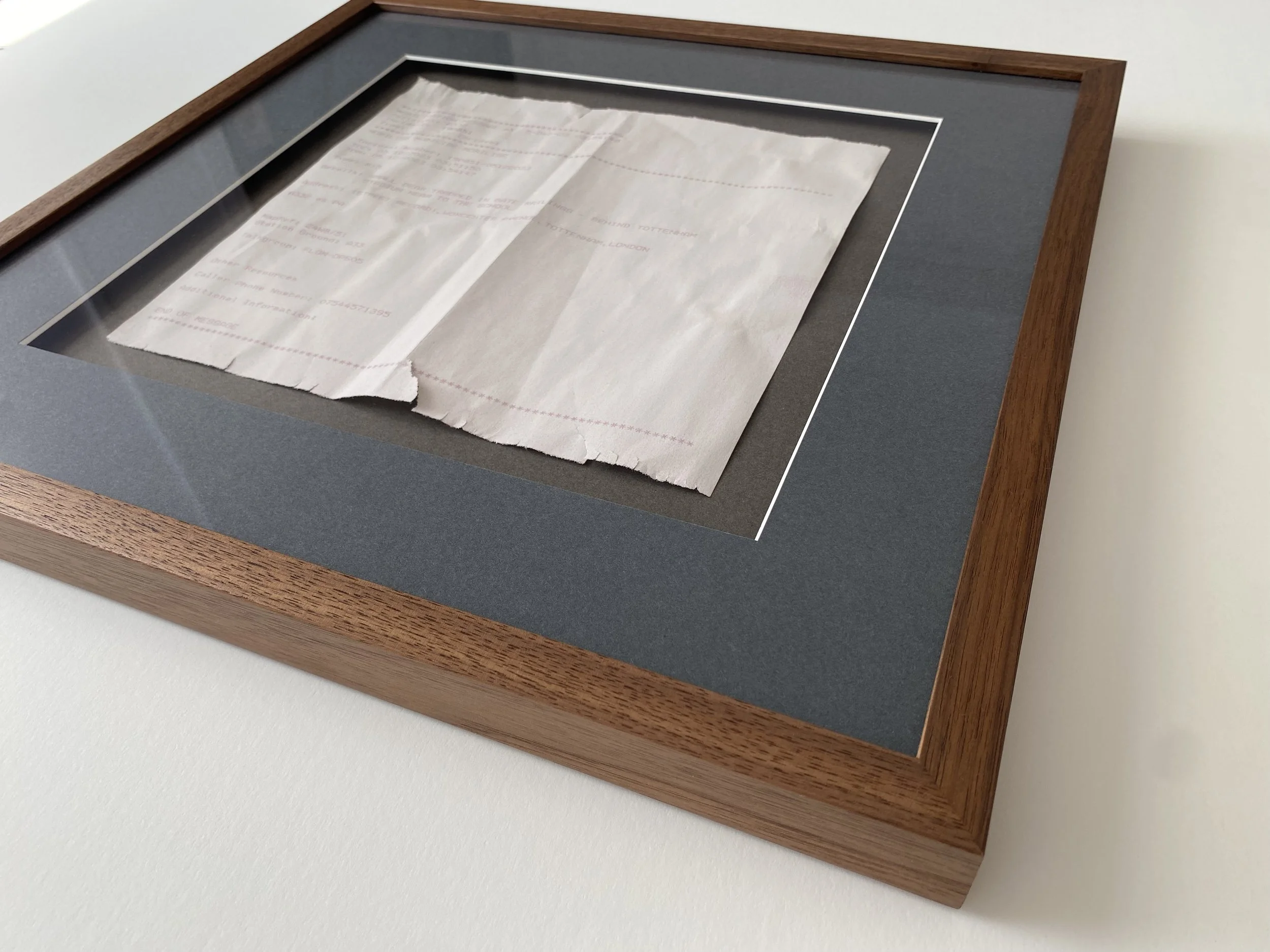 printed document framed with a gutter mount