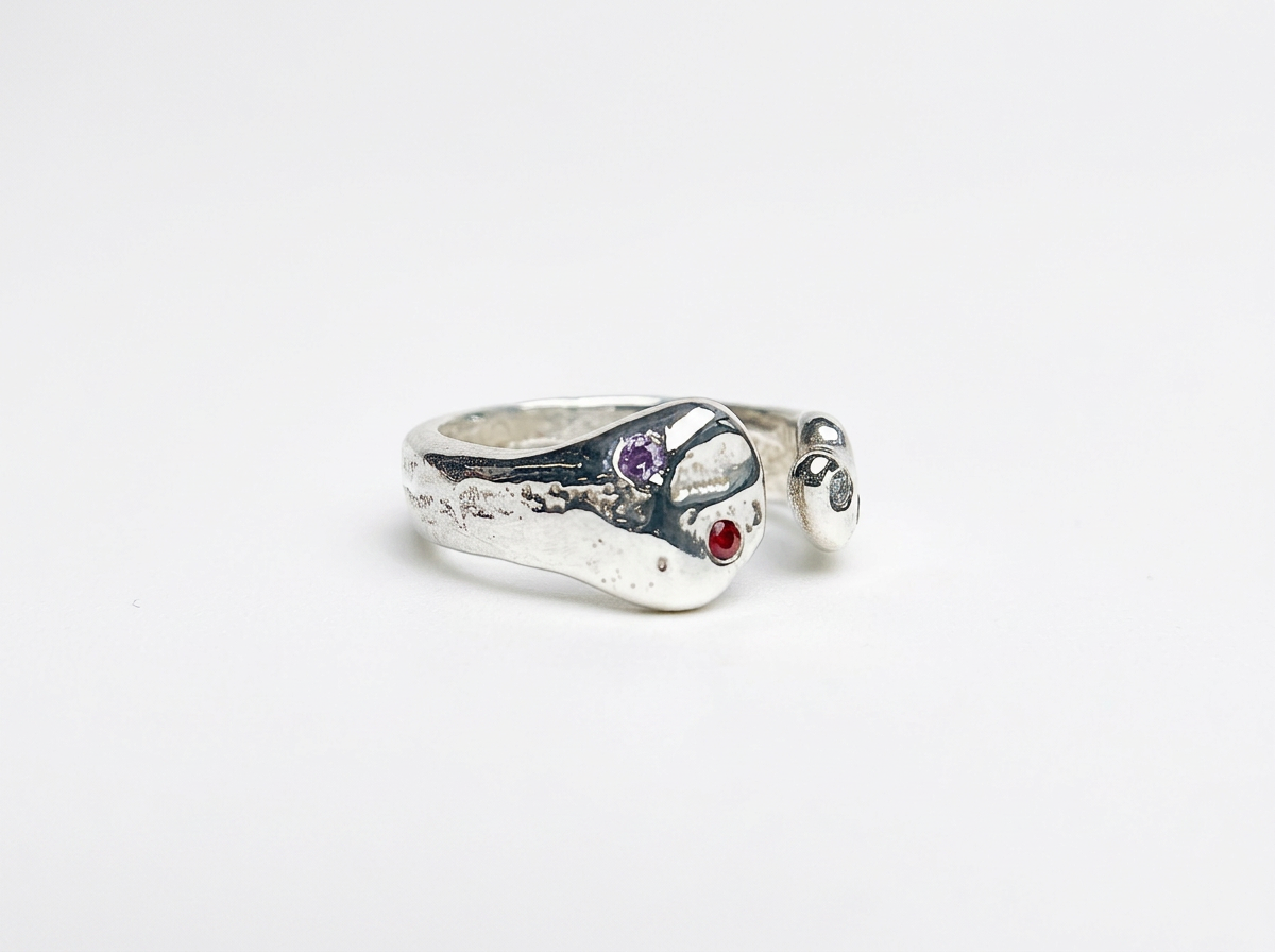 Four sapphires in sterling silver snake ring