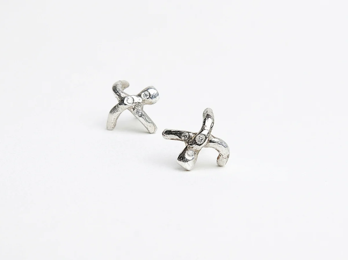 Sterling silver and diamond cross studs
