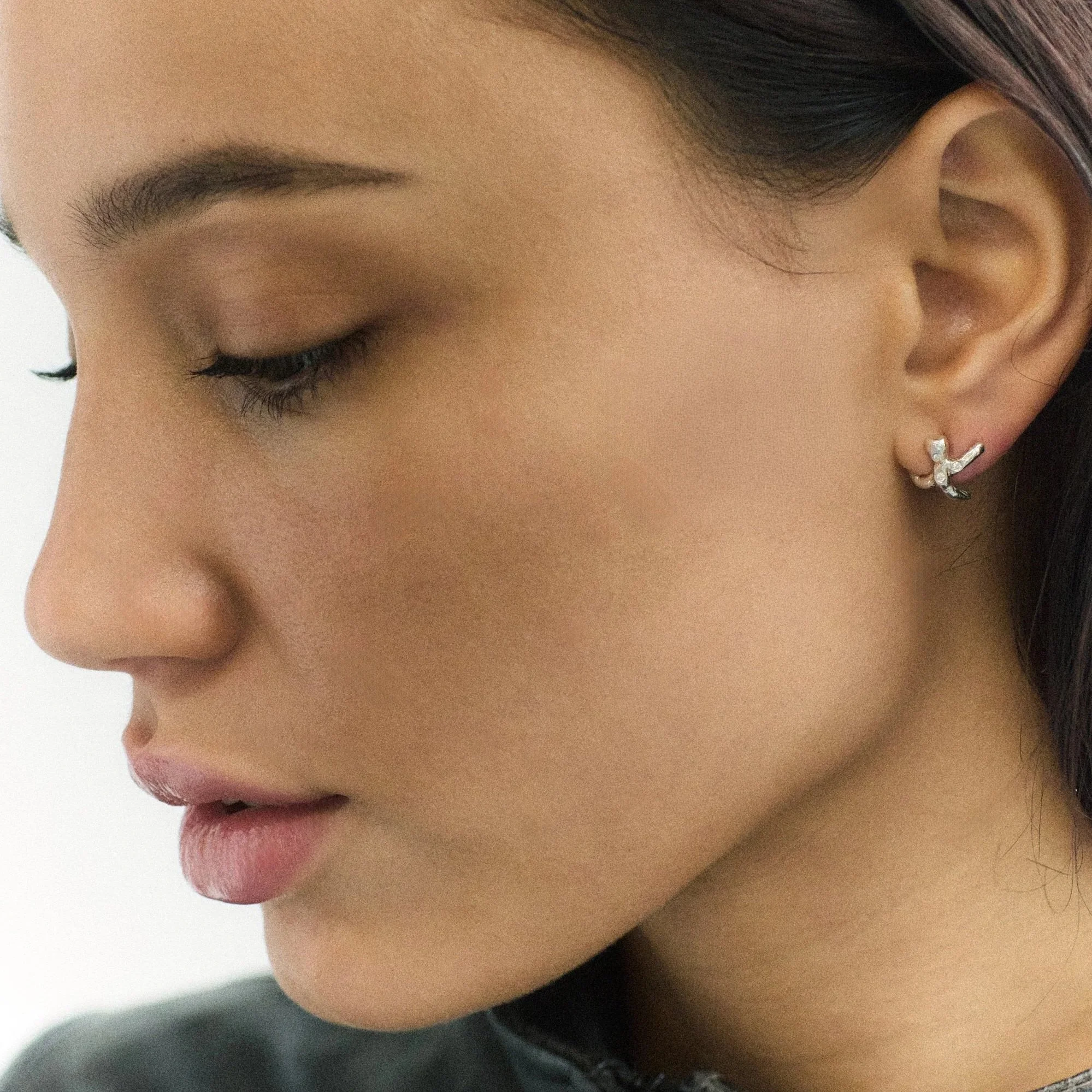Stunning model with cross bar studs