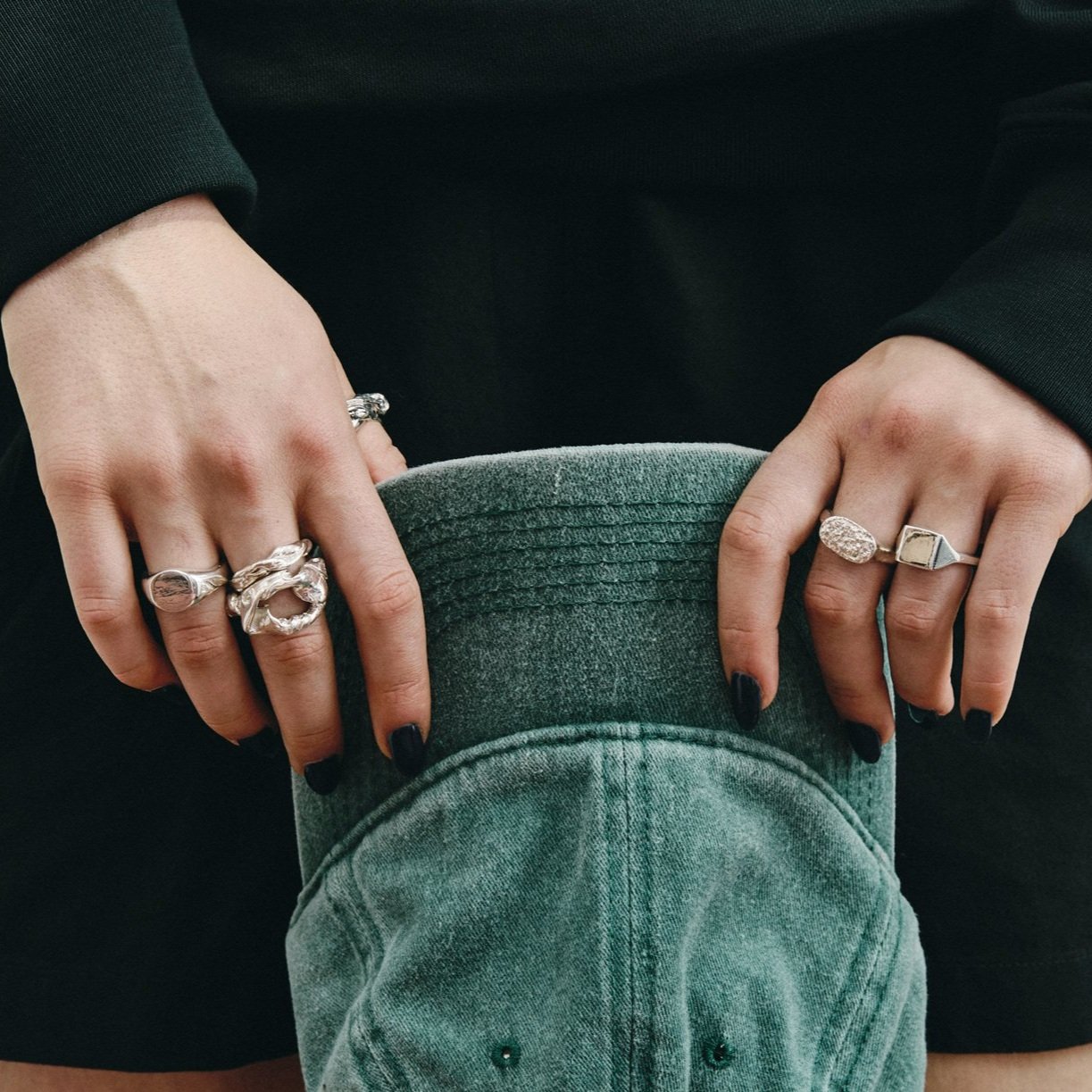 green cap and rings