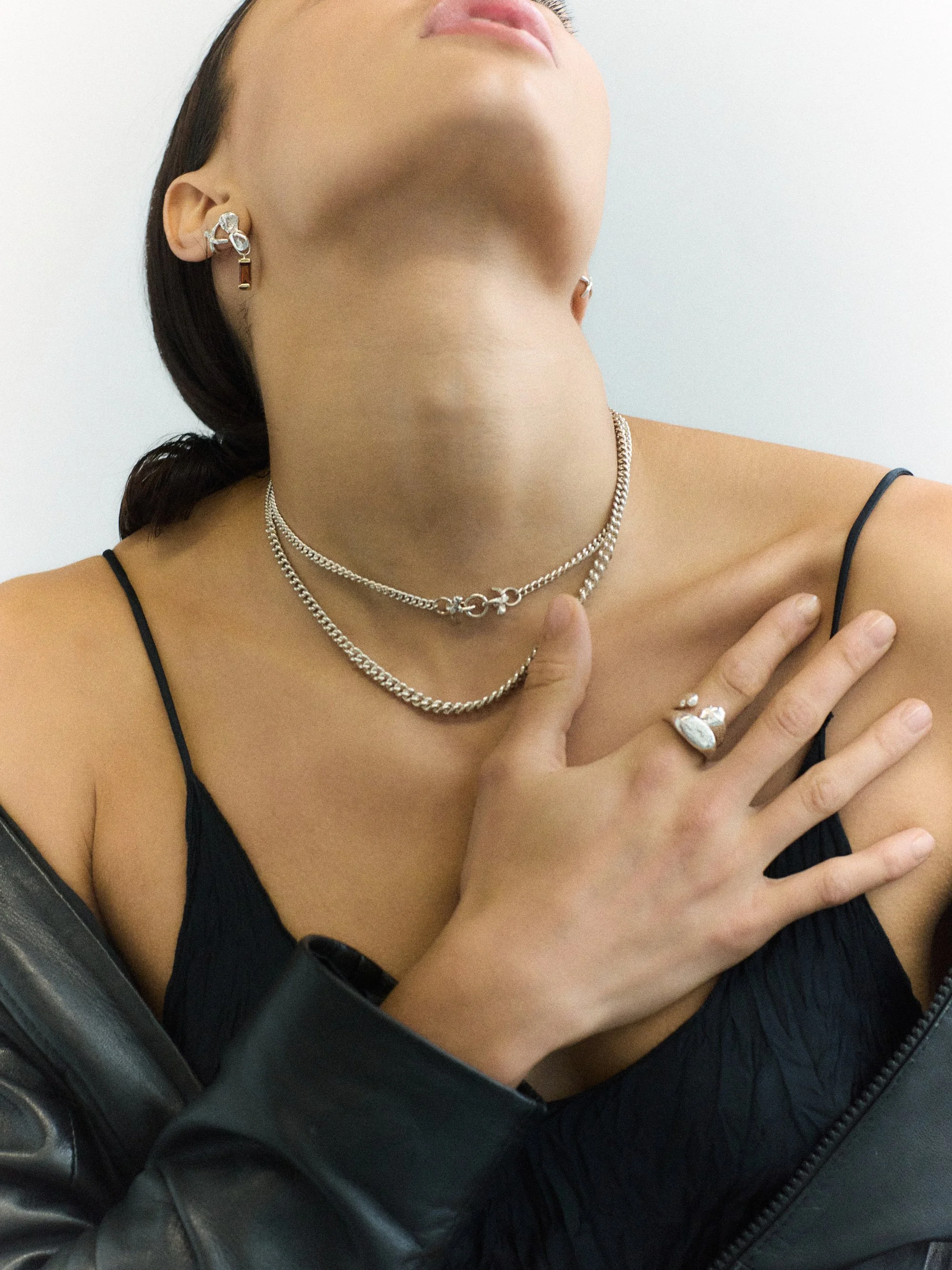 black dress and ringd on model