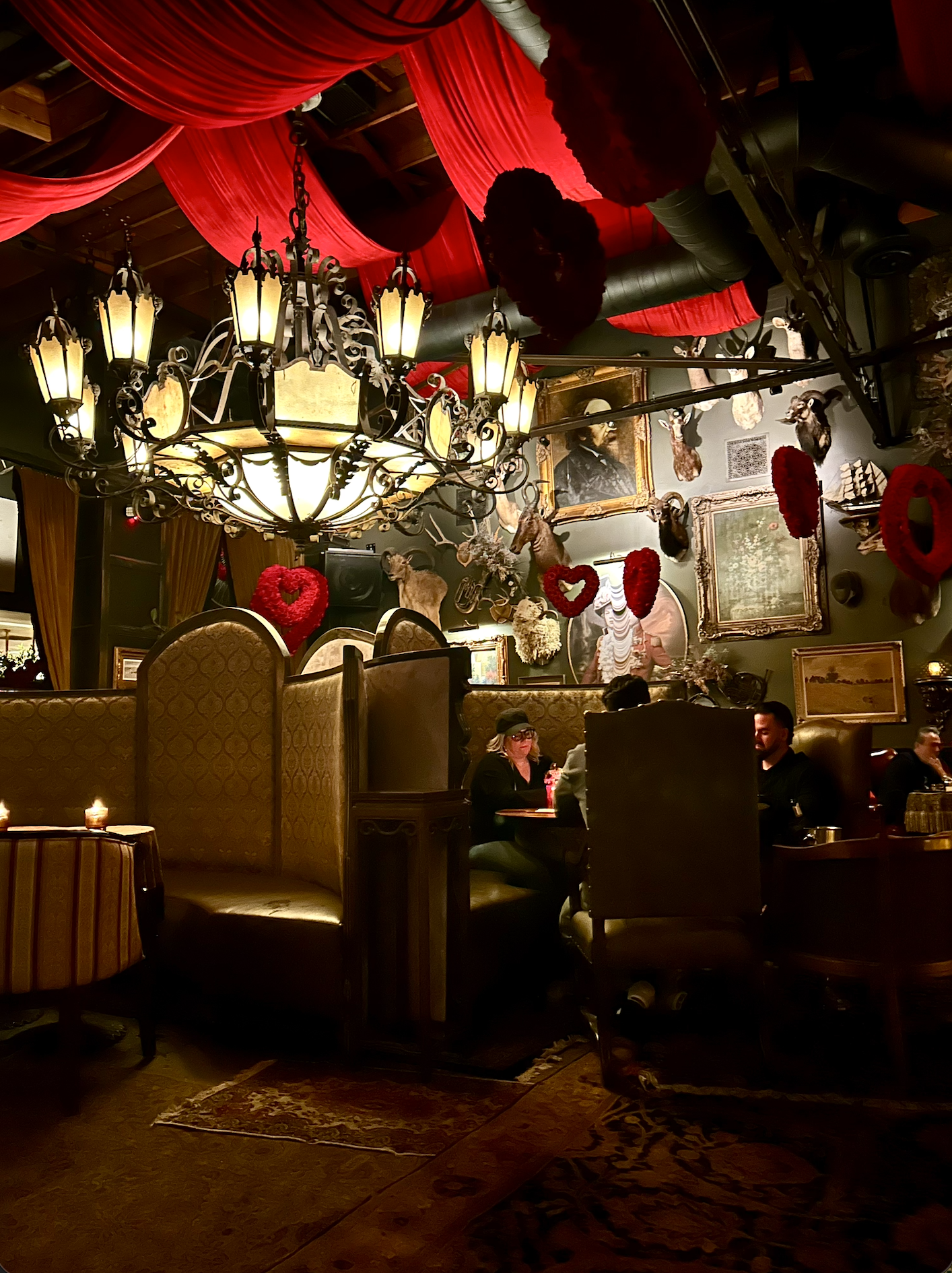 A photo of the moody and dark drawing room inside of the Doberman in Las Vegas
