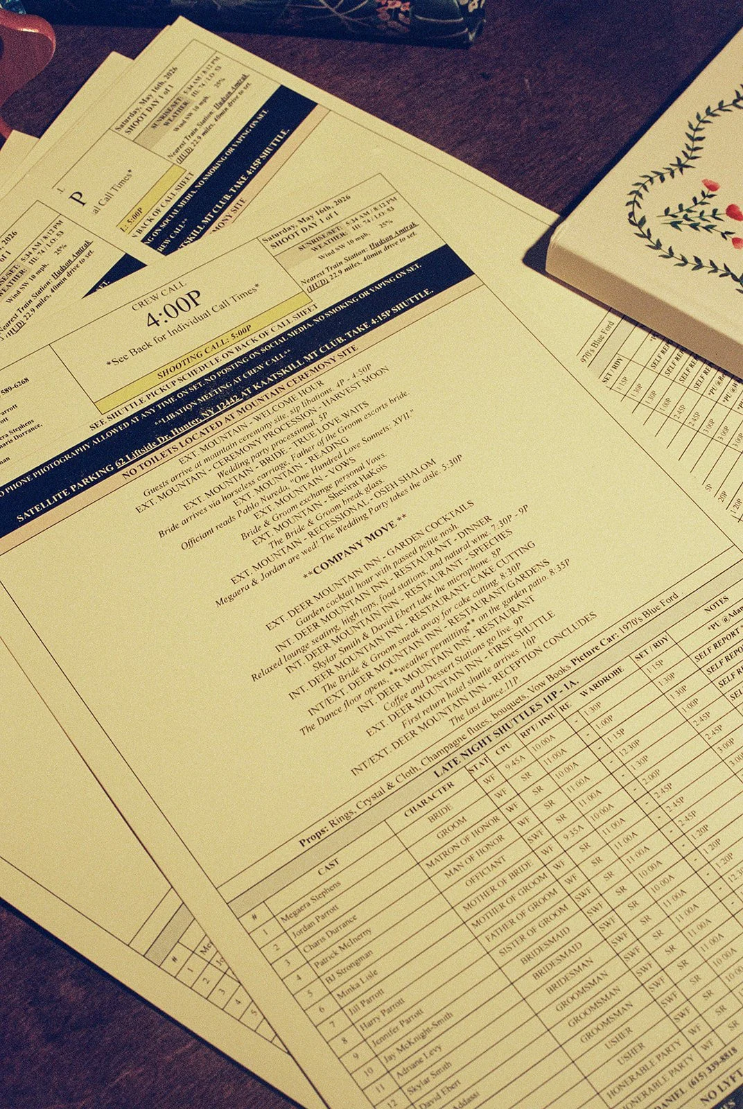Film wedding detail photo of a cinema-inspired wedding day call sheet created for a Deer Mountain Inn celebration.