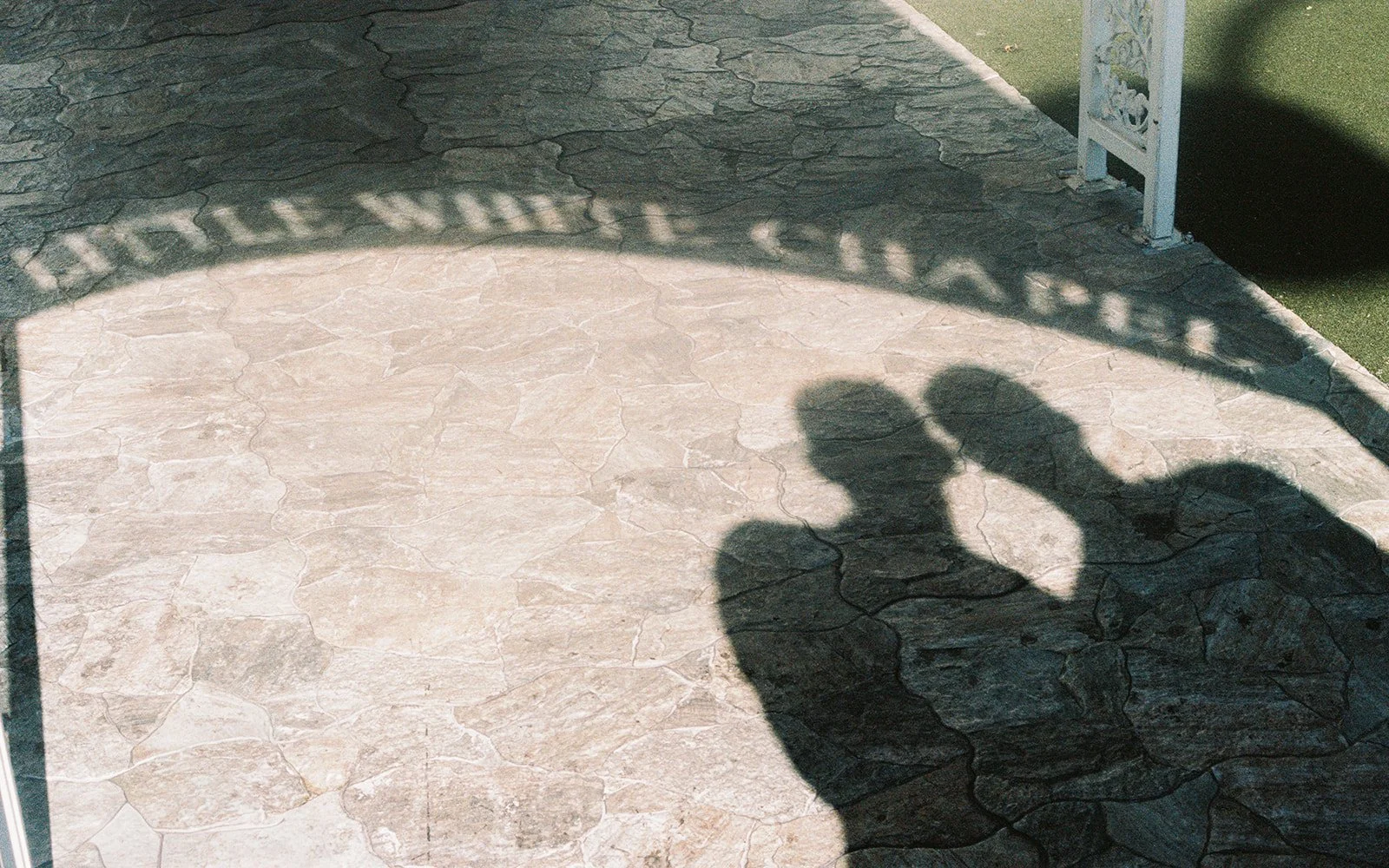 Shadows of a couple at Little White Wedding Chapel in Las Vegas on 35mm film.