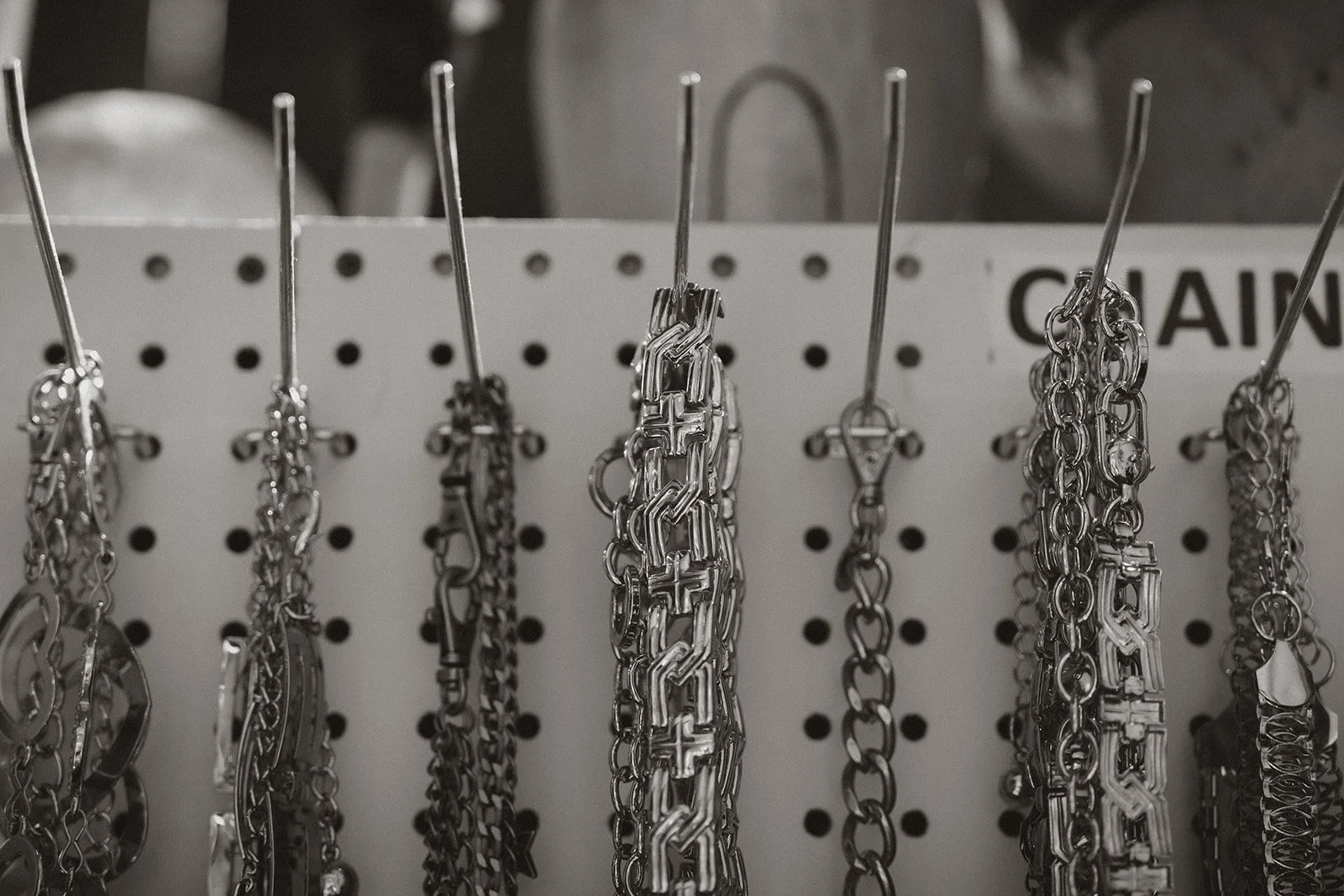 Close-up of vintage showgirl costume chains and accessories backstage during the Showgirl Bootcamp Experience in Las Vegas.