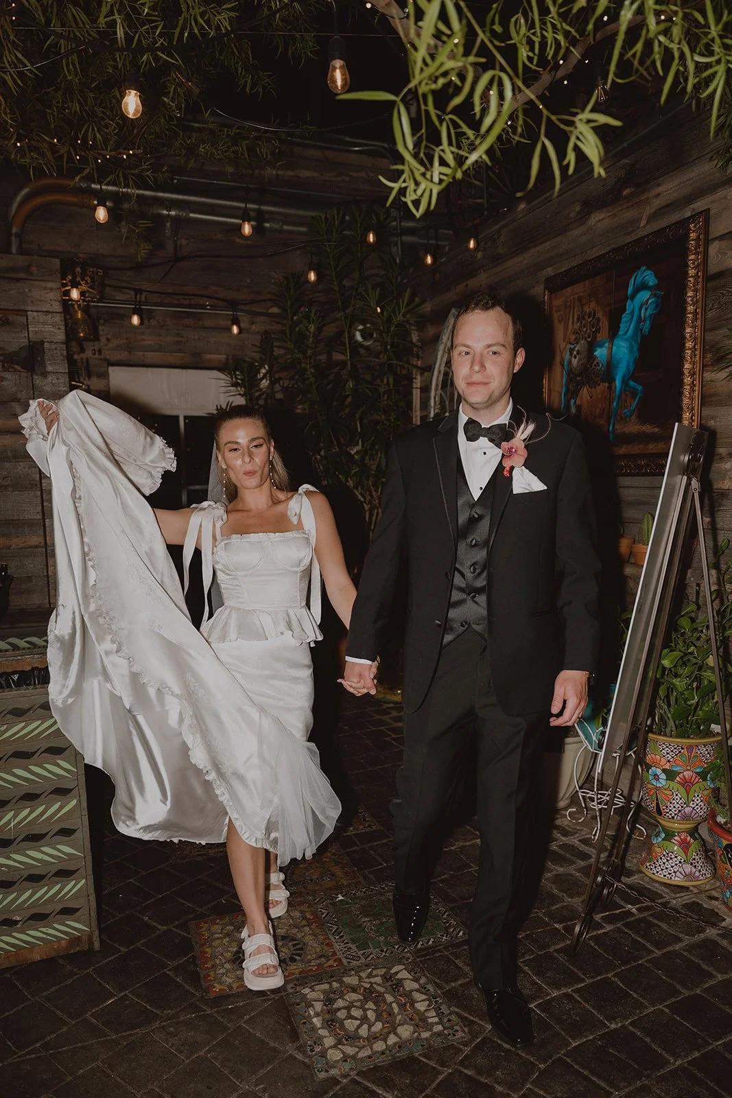 Bride and groom entering the reception at Park on Fremont in Las Vegas.
