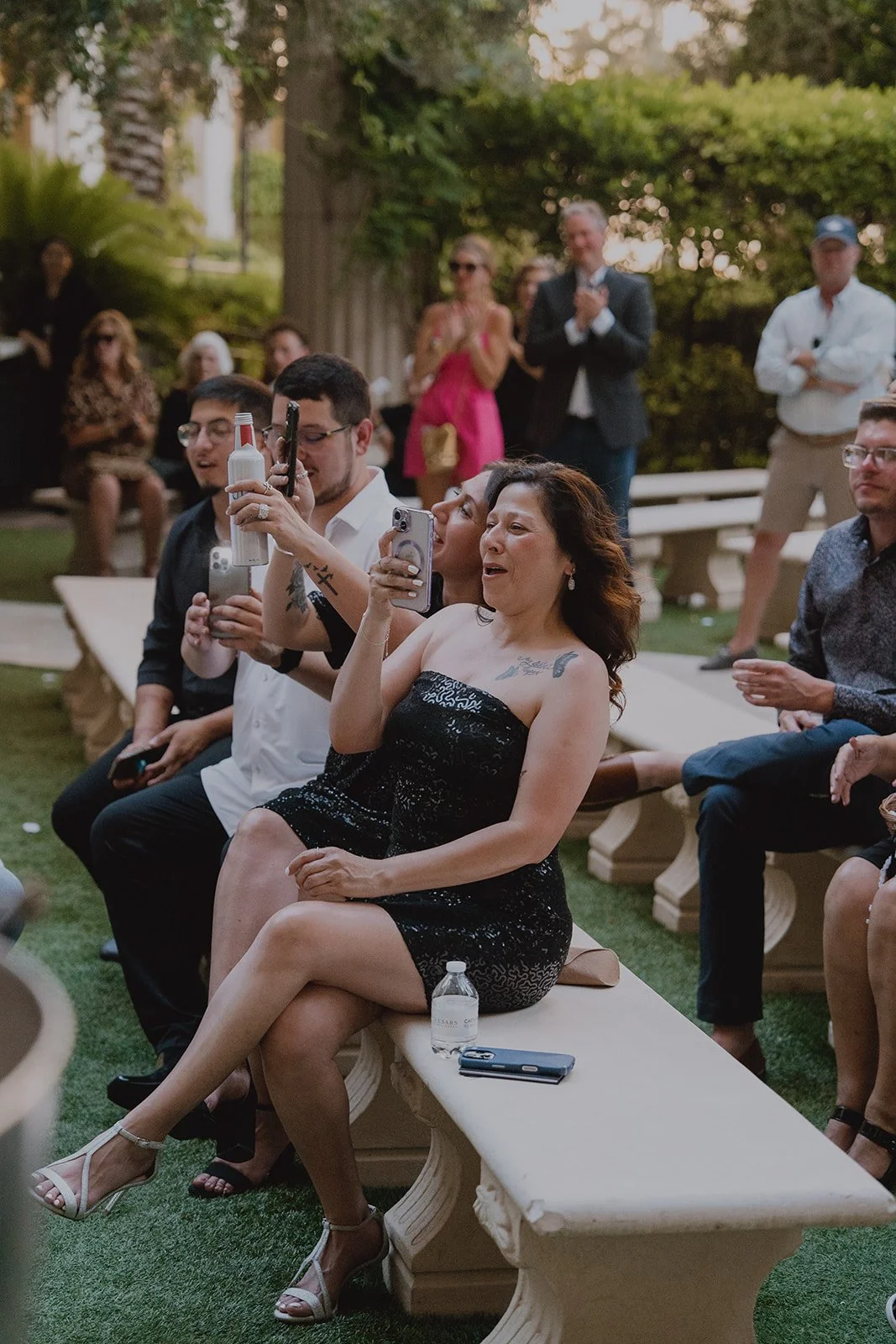 Candid guest reactions during speeches at a micro wedding in Las Vegas held at Caesars Palace.