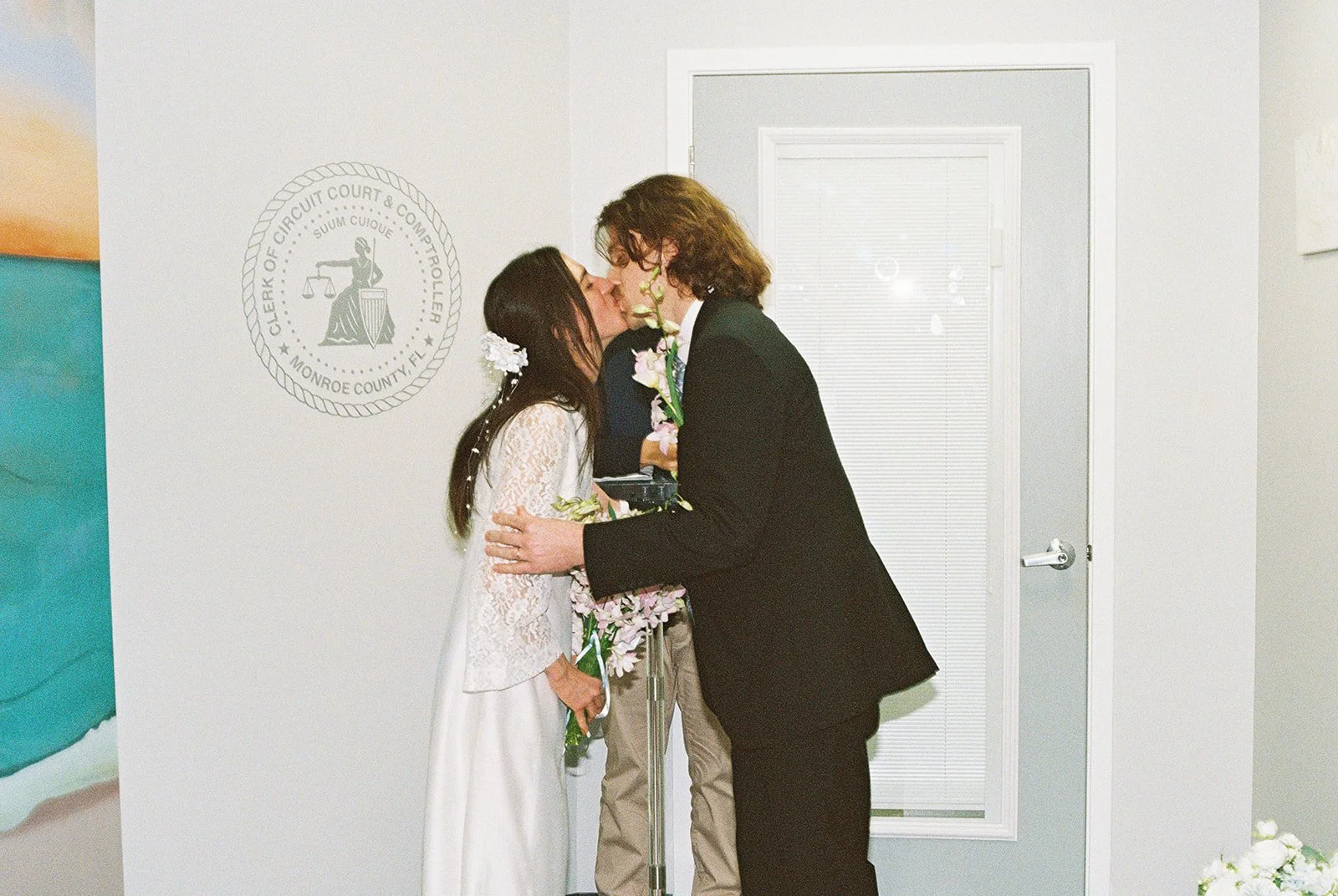 Couple kissing at the altar at Monroe County Courthouse in Key West, FL