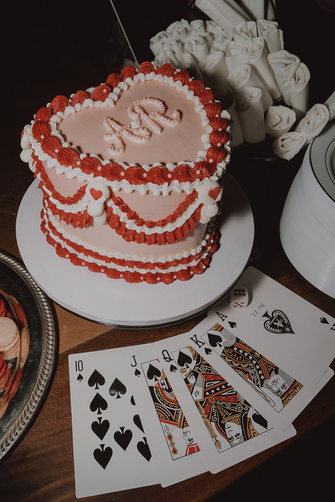 Vintage heart wedding cake by Winston Marie Cakes displayed at a Las Vegas micro wedding reception at Velveteen Rabbit.