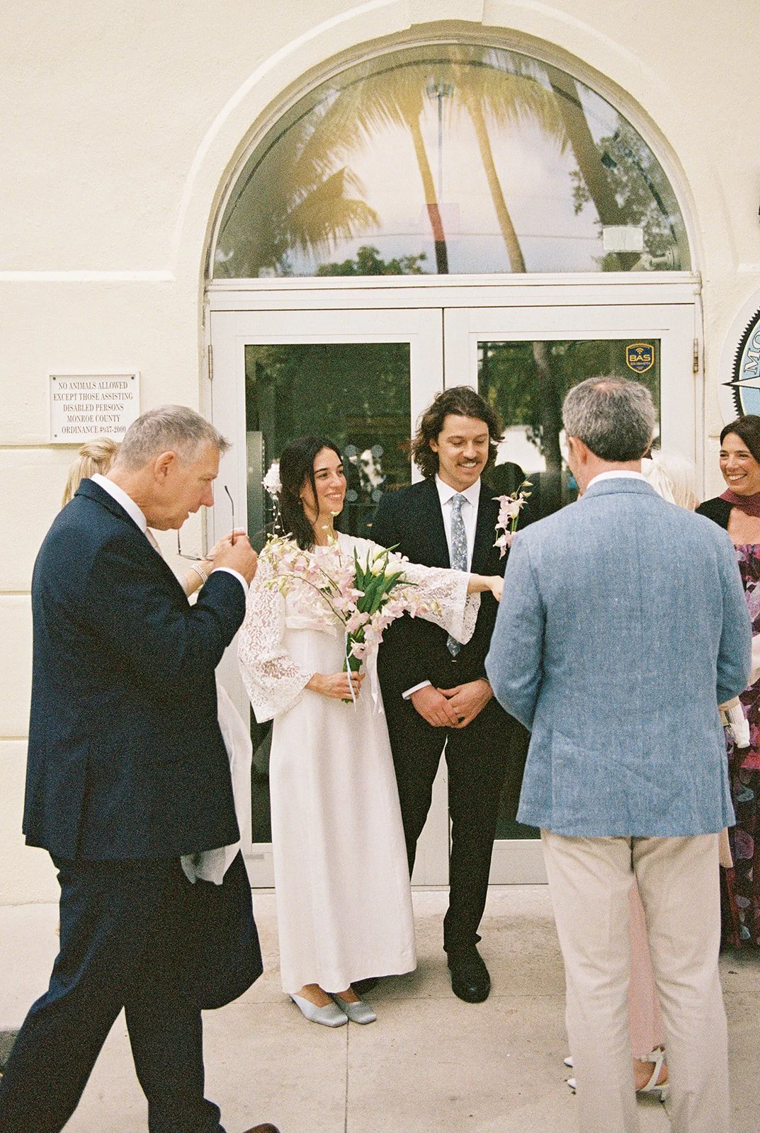 Couple coming out of the Monroe County Courthouse in Key West, FL