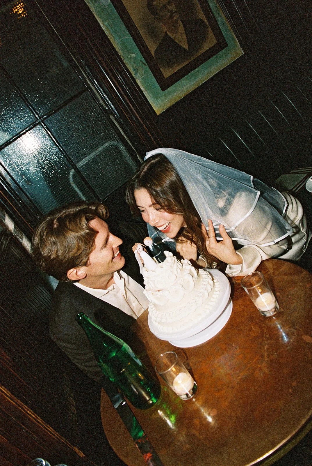 Couple having cake during their intimate NYC elopement reception.