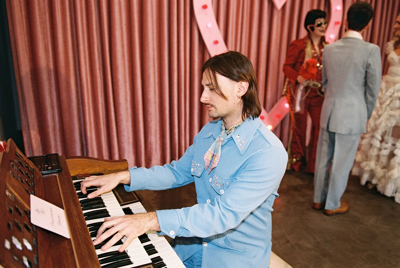 Maxime from Sure Thing Chapel playing the piano.