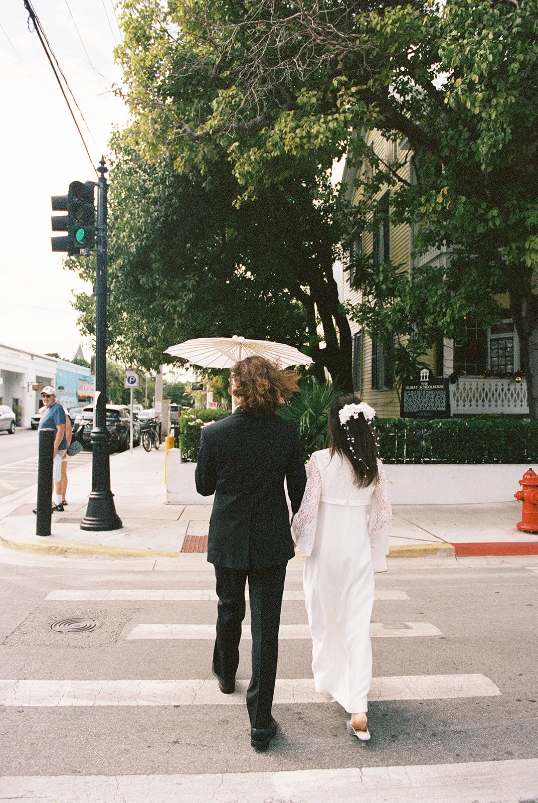 35mm film photo of a couple walking in downtown Key West Florida.