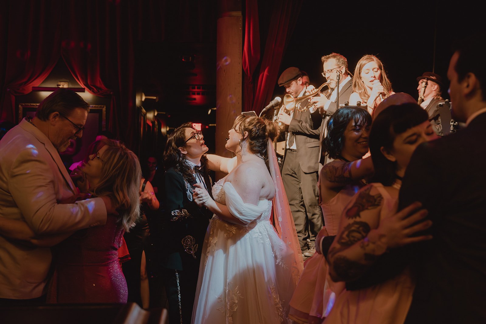 Wedding guests dancing together during a small Las Vegas wedding reception at Cheapshot.