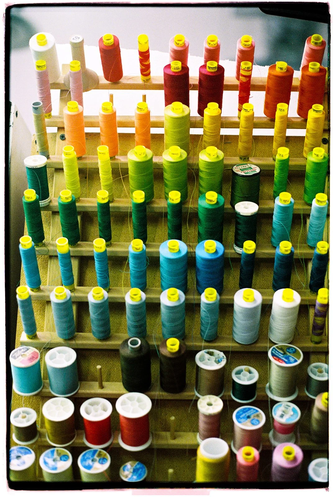 Colorful spools of thread used in creating and maintaining Las Vegas showgirl costumes, photographed during the Showgirl Bootcamp Experience.