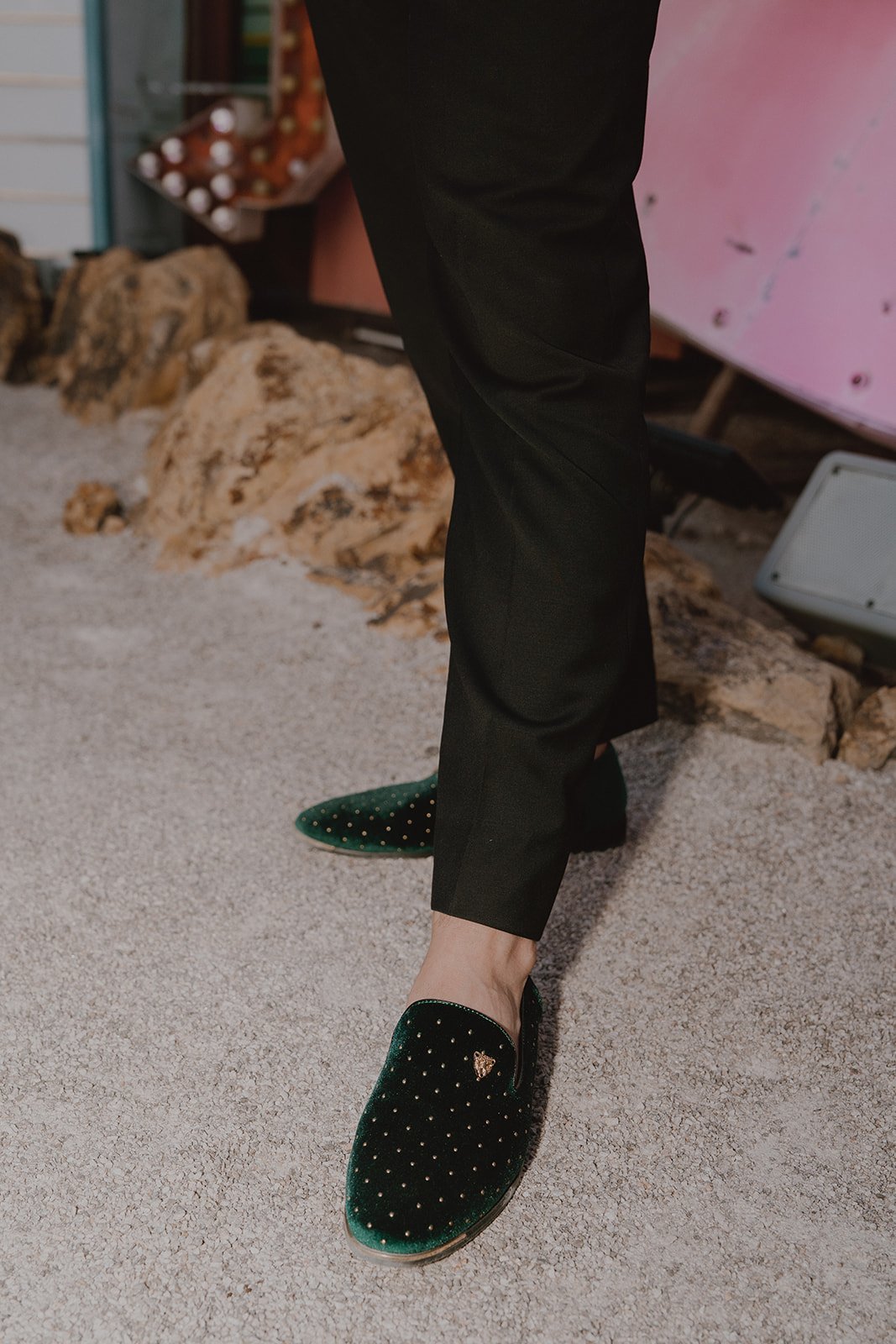 Close up shot of the groom’s green loafers during a Neon Museum Las Vegas wedding.