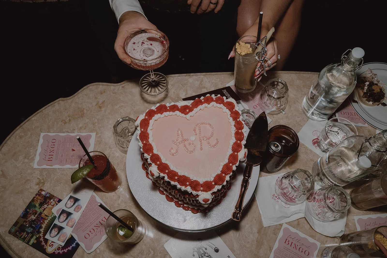 Overhead shot of a vintage heart cake by Winston Marie Cakes during their Velveteen Rabbit Las Vegas micro wedding reception.