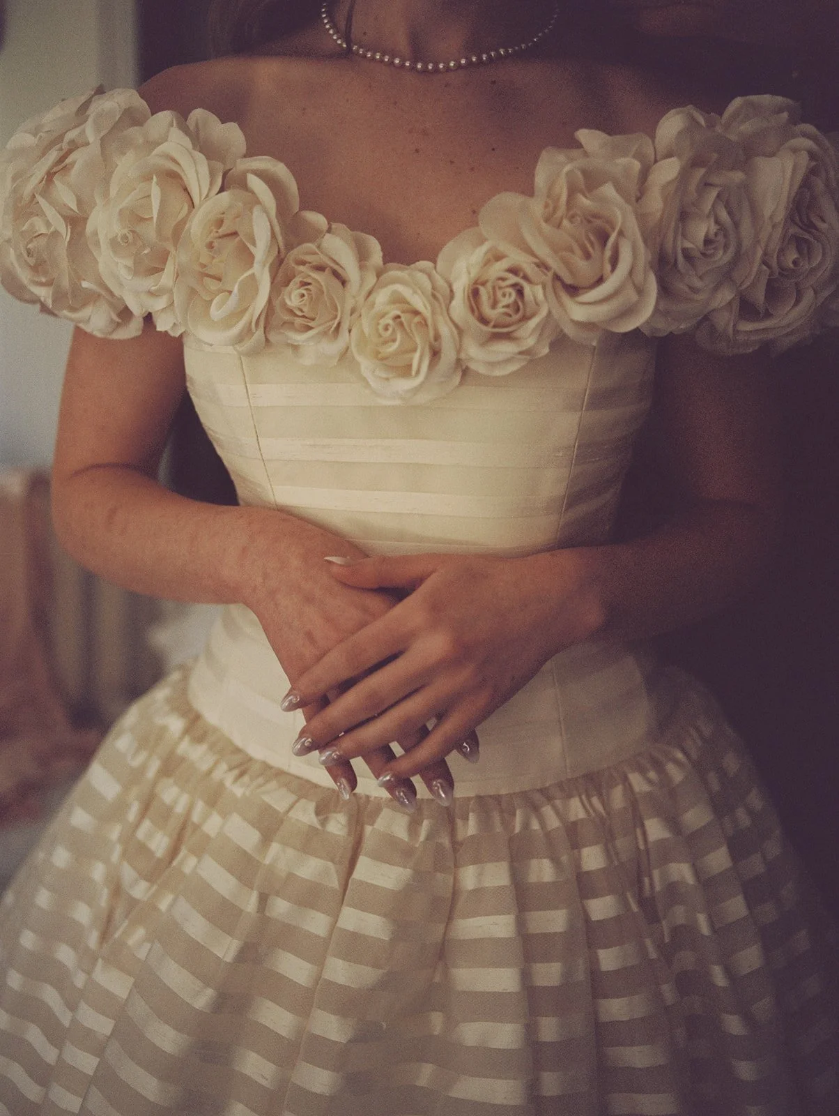 Bride wearing a Saturn bridal dress.