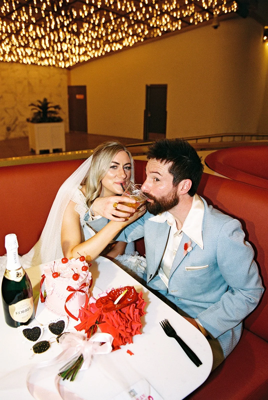Bride and groom having drinks at Carousel Bar in Las Vegas.