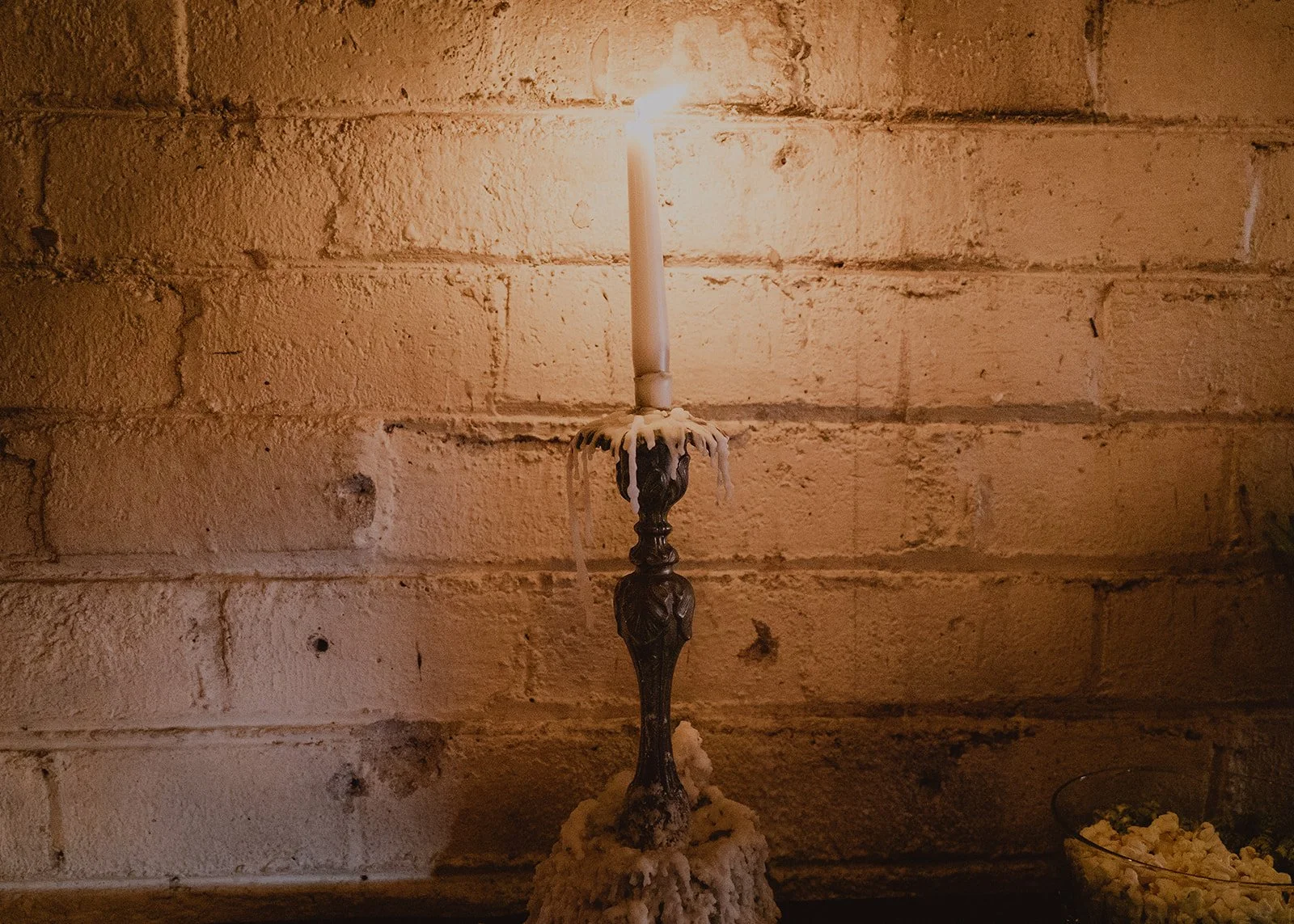 Candle on a table inside of The Laundry Room in Las Vegas.